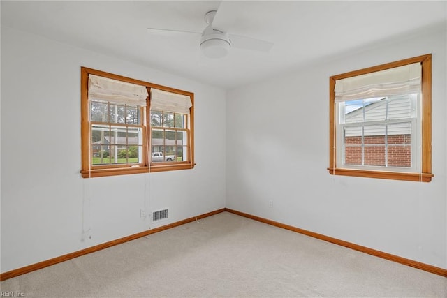 3435 Macdonald Rd, Virginia Beach, VA 23464 - spare room with light colored carpet, baseboards, and a ceiling fan