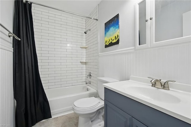 882 Elizabeth Ct, Virginia Beach, VA 23451 - full bathroom featuring vanity, shower / bath combination with curtain, toilet, a wainscoted wall, and tile patterned flooring