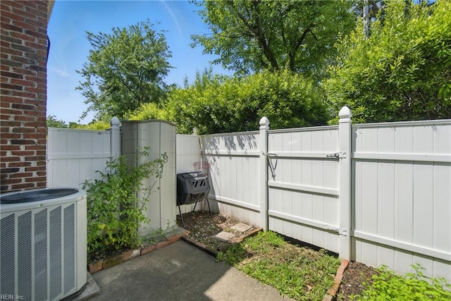 882 Elizabeth Ct, Virginia Beach, VA 23451 - view of patio with a gate and central AC unit