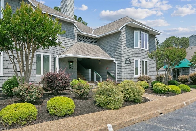 113 Pelhams Ordinary, Williamsburg, VA 23185 - shingle-style home featuring roof with shingles and a chimney