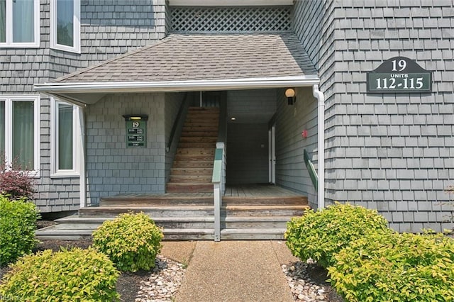113 Pelhams Ordinary, Williamsburg, VA 23185 - doorway to property with roof with shingles and covered porch