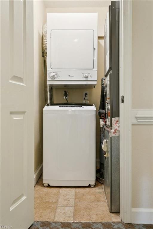 113 Pelhams Ordinary, Williamsburg, VA 23185 - washroom featuring stacked washer and clothes dryer
