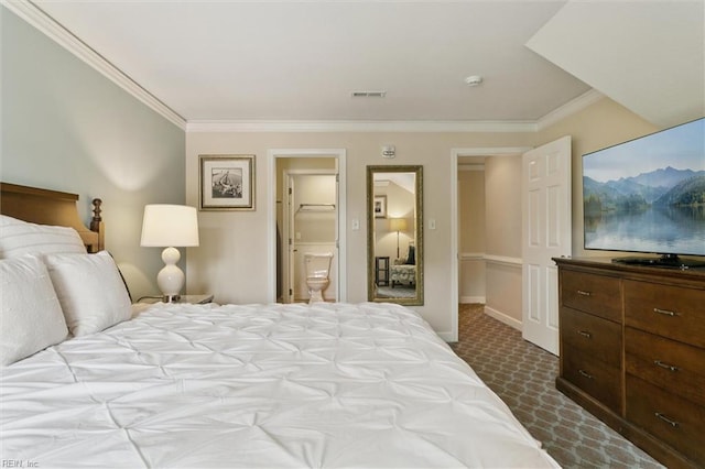 113 Pelhams Ordinary, Williamsburg, VA 23185 - bedroom with ornamental molding, dark carpet, ensuite bathroom, and baseboards
