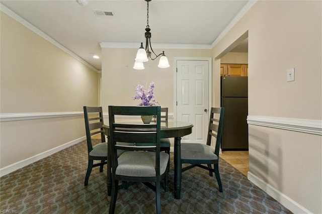 113 Pelhams Ordinary, Williamsburg, VA 23185 - dining space with baseboards, crown molding, and a chandelier