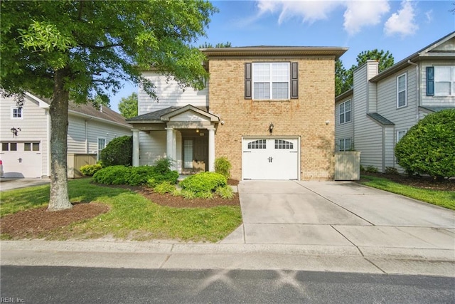 460 Blue Beech Way Unit 963, Chesapeake, VA 23320 - view of front facade with brick siding, an attached garage, and driveway