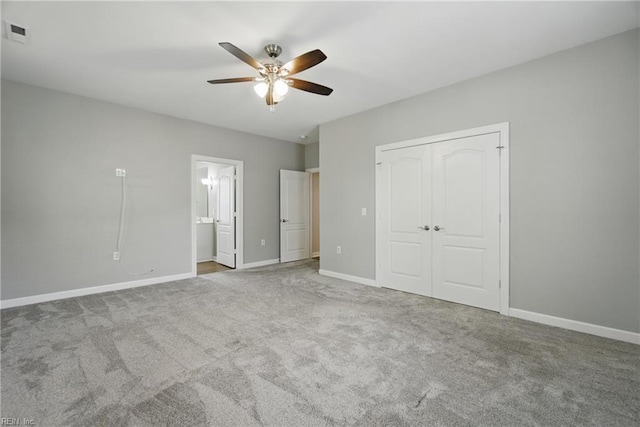 460 Blue Beech Way Unit 963, Chesapeake, VA 23320 - unfurnished bedroom featuring carpet flooring, baseboards, a closet, a ceiling fan, and ensuite bathroom
