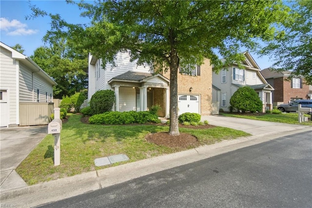 460 Blue Beech Way Unit 963, Chesapeake, VA 23320 - view of front of property with driveway, a front yard, and an attached garage