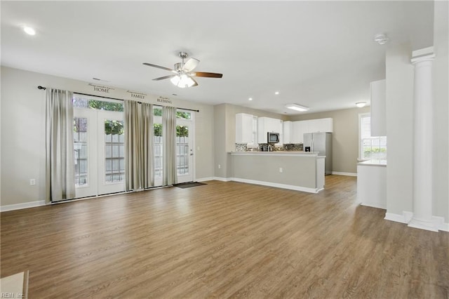 460 Blue Beech Way Unit 963, Chesapeake, VA 23320 - unfurnished living room with healthy amount of natural light, a ceiling fan, light wood-style flooring, baseboards, and recessed lighting