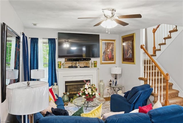 127 Rockland Ter, Suffolk, VA 23434 - living area featuring stairs, ceiling fan, and a high end fireplace