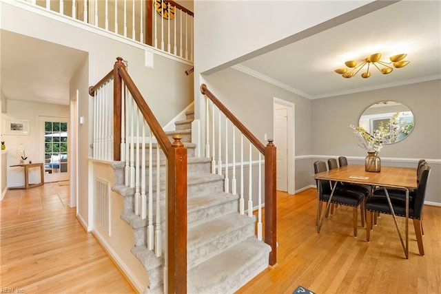 3017 Cedar Run, Williamsburg, VA 23185 - stairs featuring wood finished floors, baseboards, and ornamental molding
