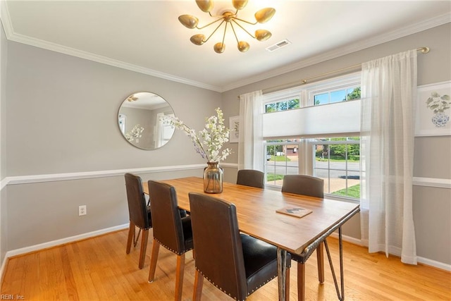 3017 Cedar Run, Williamsburg, VA 23185 - dining area with a chandelier, light wood-type flooring, plenty of natural light, baseboards, and crown molding