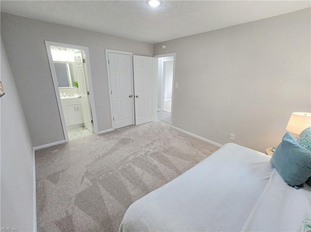 865 Kings Arms Dr, Virginia Beach, VA 23452 - carpeted bedroom with baseboards and ensuite bathroom