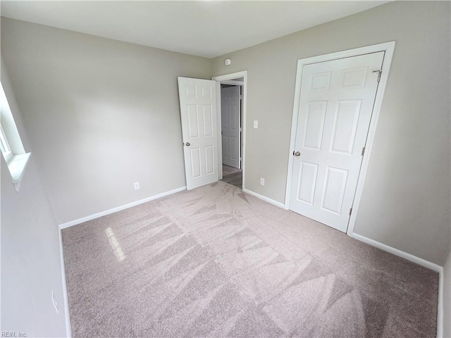 865 Kings Arms Dr, Virginia Beach, VA 23452 - unfurnished bedroom with carpet and baseboards