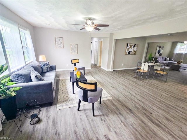 865 Kings Arms Dr, Virginia Beach, VA 23452 - living area with wood finished floors, a ceiling fan, and baseboards