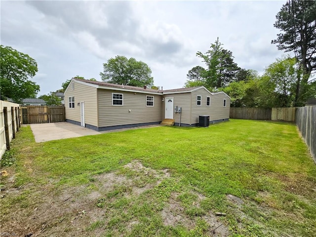 865 Kings Arms Dr, Virginia Beach, VA 23452 - rear view of house featuring entry steps, cooling unit, and a patio
