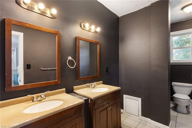2811 Mapleton Ave, Norfolk, VA 23504 - bathroom with toilet, two vanities, and tile patterned floors