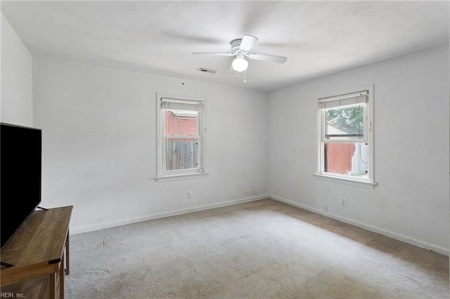 2811 Mapleton Ave, Norfolk, VA 23504 - spare room featuring carpet flooring, a ceiling fan, and baseboards