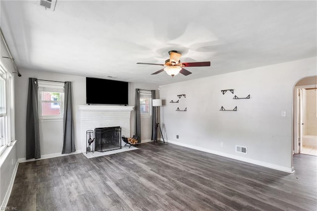 2811 Mapleton Ave, Norfolk, VA 23504 - unfurnished living room with a fireplace, wood finished floors, a ceiling fan, and baseboards