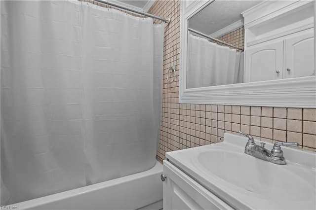 811 Wingfield Ave, Chesapeake, VA 23325 - bathroom featuring shower / bath combination with curtain, vanity, tile walls, and wallpapered walls