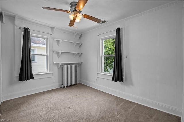 811 Wingfield Ave, Chesapeake, VA 23325 - spare room with radiator, carpet, ceiling fan, baseboards, and crown molding