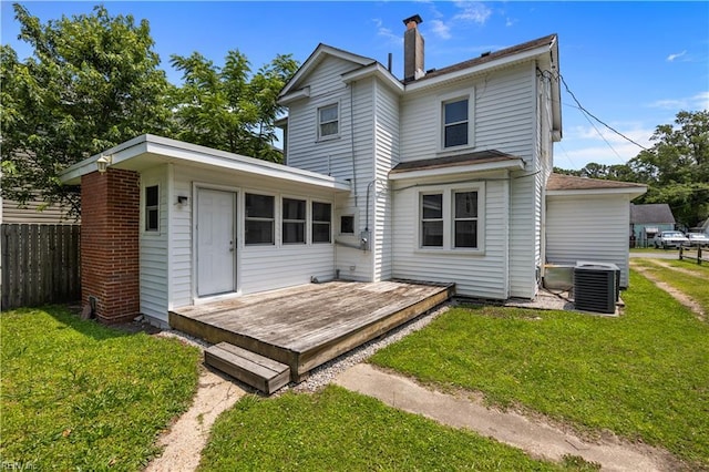 811 Wingfield Ave, Chesapeake, VA 23325 - back of property featuring a chimney, a wooden deck, and central air condition unit