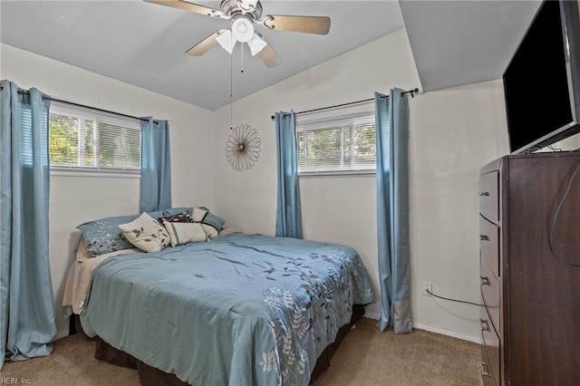 1208 Santeetlah Ave, Chesapeake, VA 23325 - carpeted bedroom with multiple windows, vaulted ceiling, ceiling fan, and baseboards
