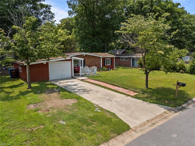 1208 Santeetlah Ave, Chesapeake, VA 23325 - single story home with concrete driveway, a front lawn, an attached garage, and brick siding