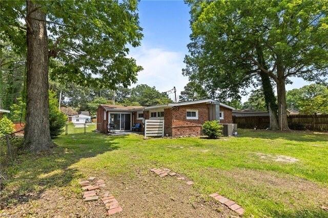 1208 Santeetlah Ave, Chesapeake, VA 23325 - rear view of house with central air condition unit and brick siding