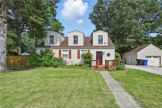 619 City Park Ave, Portsmouth, VA 23701 - cape cod home featuring an outdoor structure, a detached garage, and roof with shingles