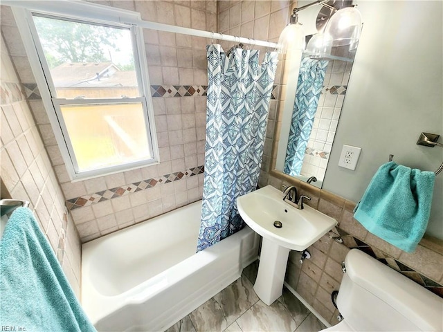 619 City Park Ave, Portsmouth, VA 23701 - bathroom featuring shower / tub combo with curtain, toilet, plenty of natural light, and tile walls