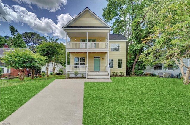 515 Buckroe Ave, Hampton, VA 23664 - view of front of property featuring a balcony, a porch, and a front yard