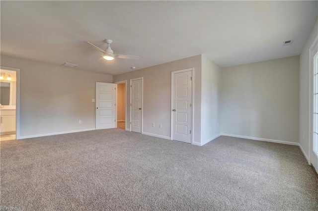 515 Buckroe Ave, Hampton, VA 23664 - unfurnished bedroom with carpet, baseboards, a ceiling fan, and ensuite bath