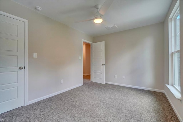 515 Buckroe Ave, Hampton, VA 23664 - carpeted spare room with a ceiling fan, baseboards, and healthy amount of natural light