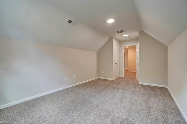 515 Buckroe Ave, Hampton, VA 23664 - bonus room with light colored carpet, vaulted ceiling, and baseboards