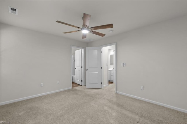 1102 Lakeview Cv, Smithfield, VA 23430 - unfurnished bedroom with ensuite bathroom, baseboards, light carpet, and ceiling fan