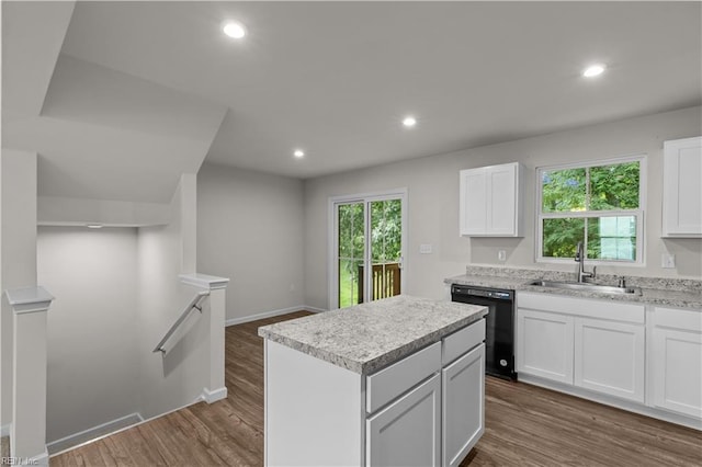 1102 Lakeview Cv, Smithfield, VA 23430 - kitchen with dishwasher, a sink, a center island, white cabinetry, and recessed lighting