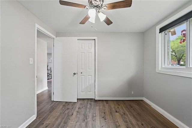 2007 Neville Cir, Hampton, VA 23663 - unfurnished bedroom featuring baseboards, wood finished floors, a closet, and a ceiling fan