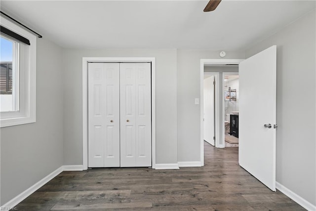 2007 Neville Cir, Hampton, VA 23663 - unfurnished bedroom featuring baseboards, dark wood-style flooring, and a closet