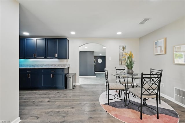 2007 Neville Cir, Hampton, VA 23663 - dining area with arched walkways, light wood-type flooring, recessed lighting, and baseboards