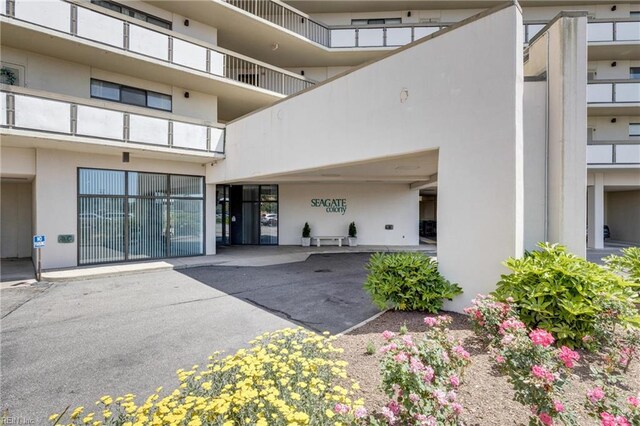 2830 Shore Dr Unit 1006, Virginia Beach, VA 23451 - entrance to property featuring stucco siding