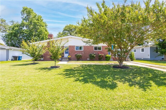 708 Houdon Ln, Virginia Beach, VA 23455 - ranch-style home featuring a front lawn, a chimney, and brick siding