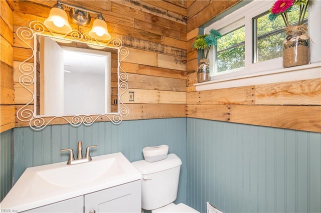 708 Houdon Ln, Virginia Beach, VA 23455 - bathroom with toilet, vanity, and wooden walls
