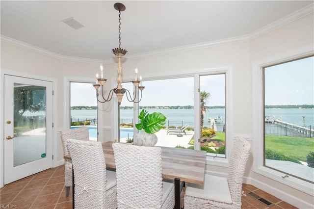 2365 Haversham Close Close, Virginia Beach, VA 23454 - tiled dining area with a chandelier, healthy amount of natural light, crown molding, and a water view