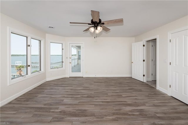 2365 Haversham Close Close, Virginia Beach, VA 23454 - spare room with a ceiling fan, wood finished floors, baseboards, and a water view