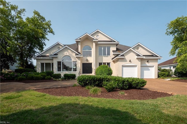 2365 Haversham Close Close, Virginia Beach, VA 23454 - traditional-style house featuring driveway, a front yard, and a garage