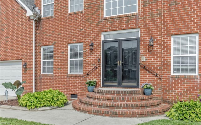 2129 Bierce Dr, Virginia Beach, VA 23454 - entrance to property with french doors, brick siding, and crawl space