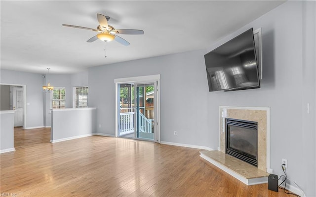 2129 Bierce Dr, Virginia Beach, VA 23454 - unfurnished living room featuring wood finished floors, a high end fireplace, and baseboards