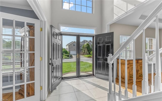 2129 Bierce Dr, Virginia Beach, VA 23454 - entryway featuring light tile patterned flooring, a high ceiling, plenty of natural light, and stairway