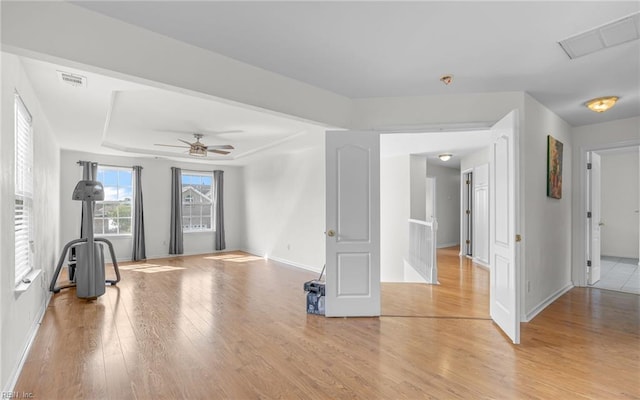 2129 Bierce Dr, Virginia Beach, VA 23454 - unfurnished living room featuring light wood-style flooring, baseboards, and a ceiling fan