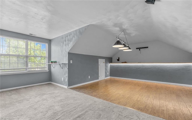 2129 Bierce Dr, Virginia Beach, VA 23454 - bonus room with baseboards, lofted ceiling, and carpet flooring